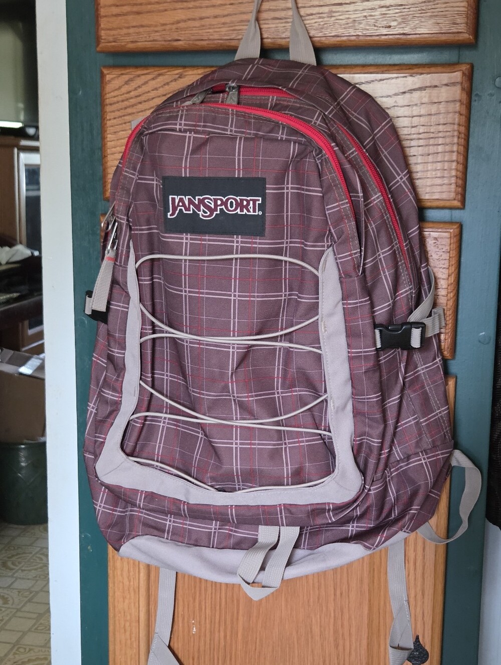 JanSport Plaid Backpack with Red Zipper Accents